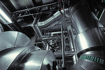 Image showing Equipment, cables and piping as found inside of a modern industr