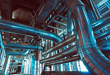 Image showing Equipment, cables and piping as found inside of a modern industrial power plant