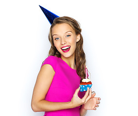 Image showing happy woman or teen girl with birthday cupcake