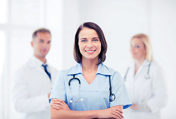 Image showing young female doctor with stethoscope