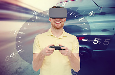 Image showing man in virtual reality headset and car racing game