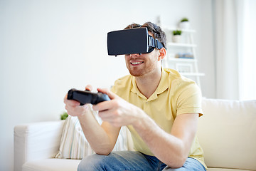 Image showing man in virtual reality headset with controller