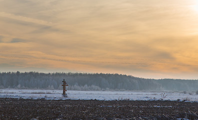 Image showing Wintertime sunset over meadow