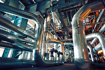 Image showing Equipment, cables and piping as found inside of a modern industr