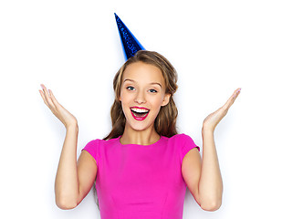 Image showing happy young woman or teen girl in party cap