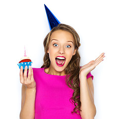 Image showing happy woman or teen girl with birthday cupcake