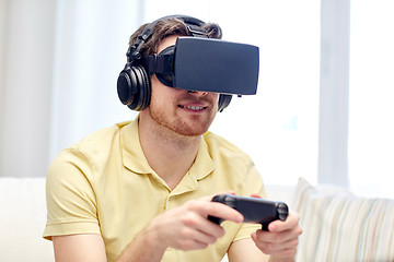 Image showing man in virtual reality headset with controller
