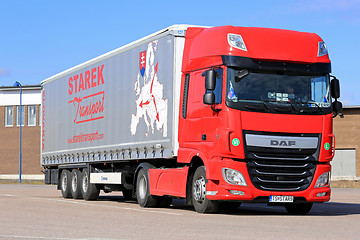 Image showing New Red DAF Semi Truck Parked on Asphalt Yard