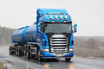 Image showing Blue Scania Tank Truck Trucking in Snowfall