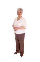 Image showing Elderly woman standing for white background.