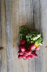 Image showing bunch of fresh radish on a wooden