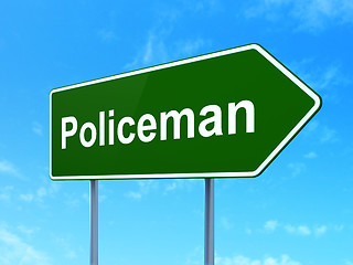 Image showing Law concept: Policeman on road sign background