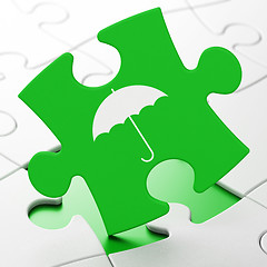 Image showing Privacy concept: Umbrella on puzzle background