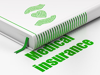 Image showing Insurance concept: book Heart And Palm, Medical Insurance on white background