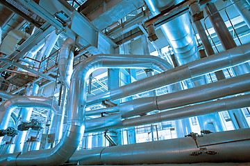 Image showing different size and shaped pipes and valves at a power plant 