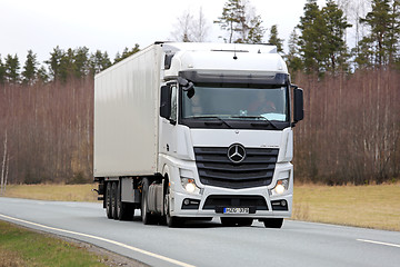 Image showing White Mercedes-Benz Actros Semi Truck on Spring Road