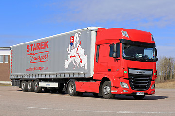 Image showing New Red DAF XF Semi Truck and Blue Sky