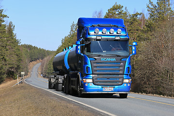 Image showing Blue Scania Tank Truck on Rural Road at Spring