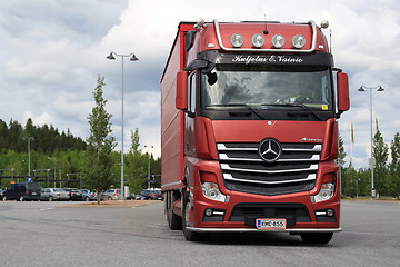 Image showing Red Mercedes-Benz Actros Leaves Truck Stop