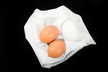 Image showing Boiled eggs isolated on black background 