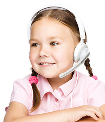 Image showing Young girl is working as an operator at helpline