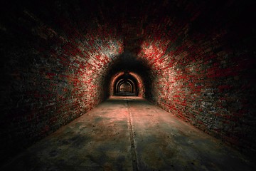 Image showing Long underground brick tunnel angle shot