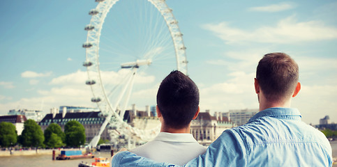 Image showing close up of male gay couple looking at london view