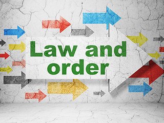 Image showing Law concept: arrow with Law And Order on grunge wall background