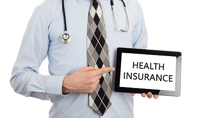 Image showing Doctor holding tablet - Health insurance