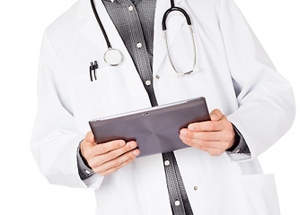 Image showing Doctor holding tablet with copy space and clipping path for the 