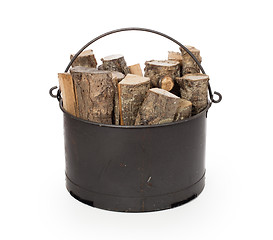 Image showing Metal basket of firewood