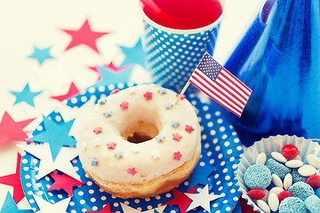 Image showing donut with juice and candies on independence day