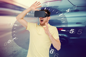 Image showing man in virtual reality headset and car racing game