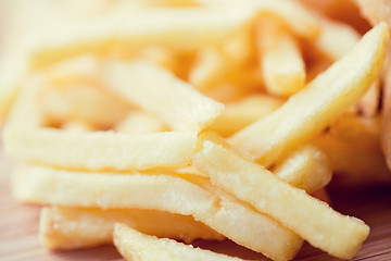 Image showing close up of french fries on table