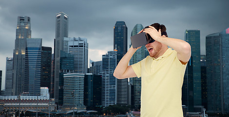 Image showing happy man in virtual reality headset or 3d glasses