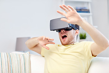 Image showing young man in virtual reality headset or 3d glasses