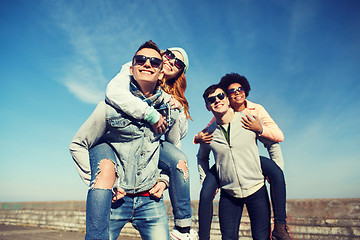 Image showing happy friends in shades having fun outdoors