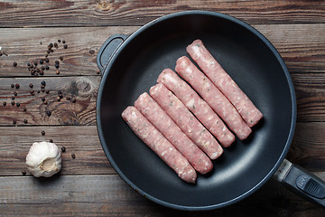 Image showing Raw Sausages in a Pan