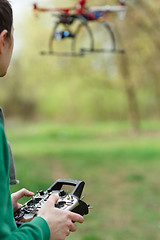 Image showing Man controling a drone.