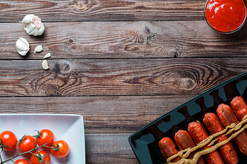 Image showing Sausage roasted on the grill.