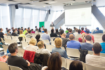 Image showing Male speeker having talk at public event.