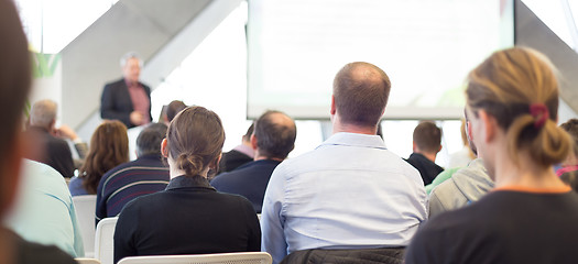 Image showing Male speeker having talk at public event.