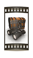 Image showing binoculars and chest. The film strip