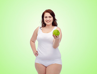 Image showing happy plus size woman in underwear with apple