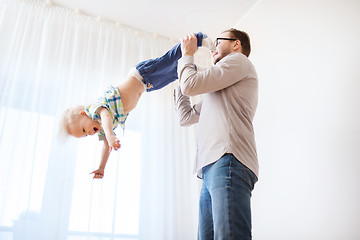 Image showing father with son playing and having fun at home