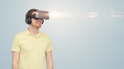 Image showing happy man in virtual reality headset or 3d glasses