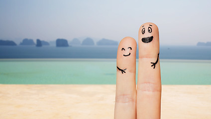 Image showing close up of two fingers with smiley faces