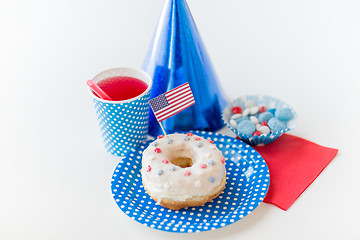 Image showing donut with juice and candies on independence day