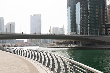 Image showing Dubai city center with skyscrapers and bridge