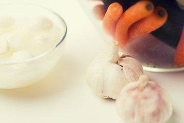 Image showing close up of garlic, carrot and mozzarella cheese